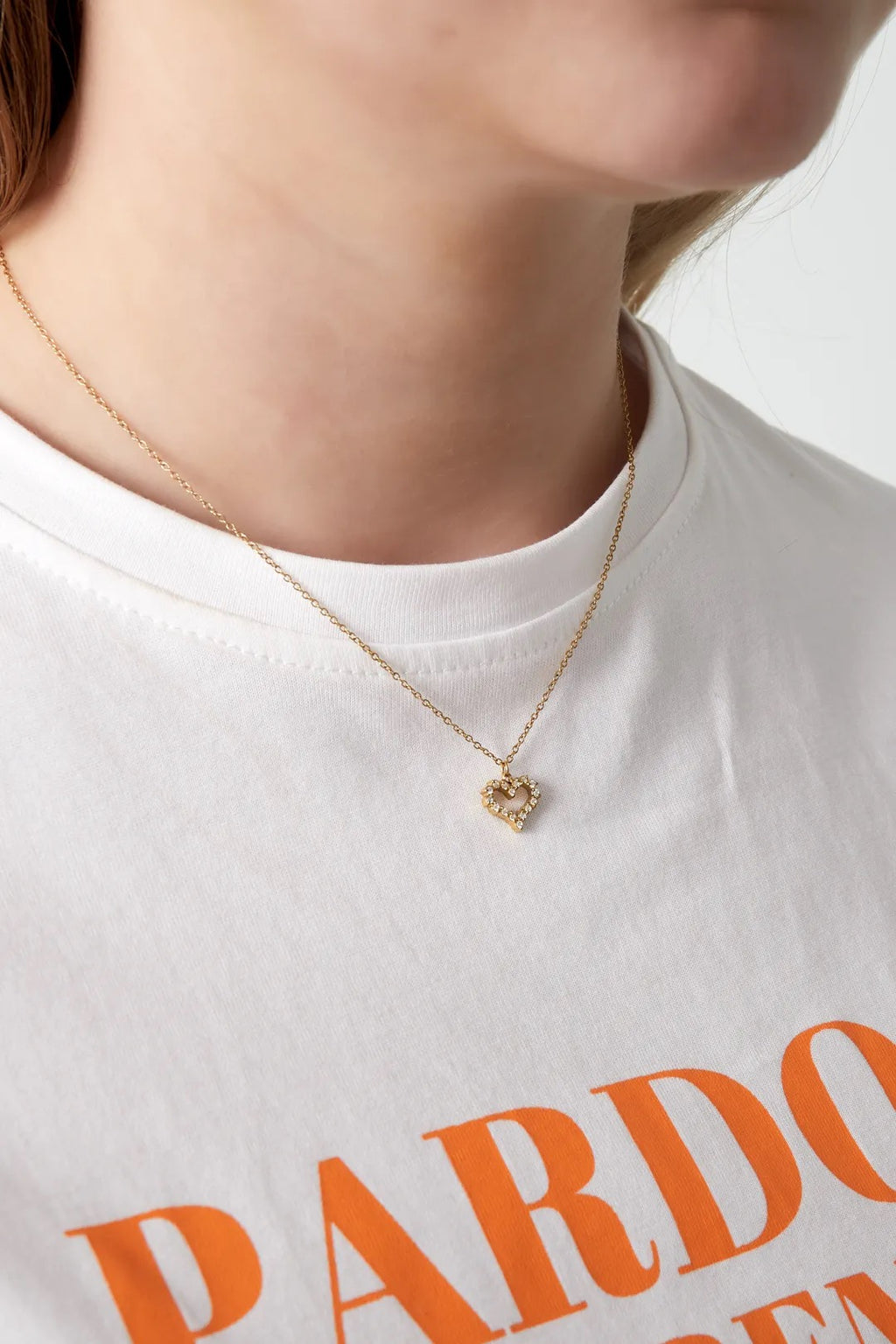 Ketting hartvormige strass hanger goud